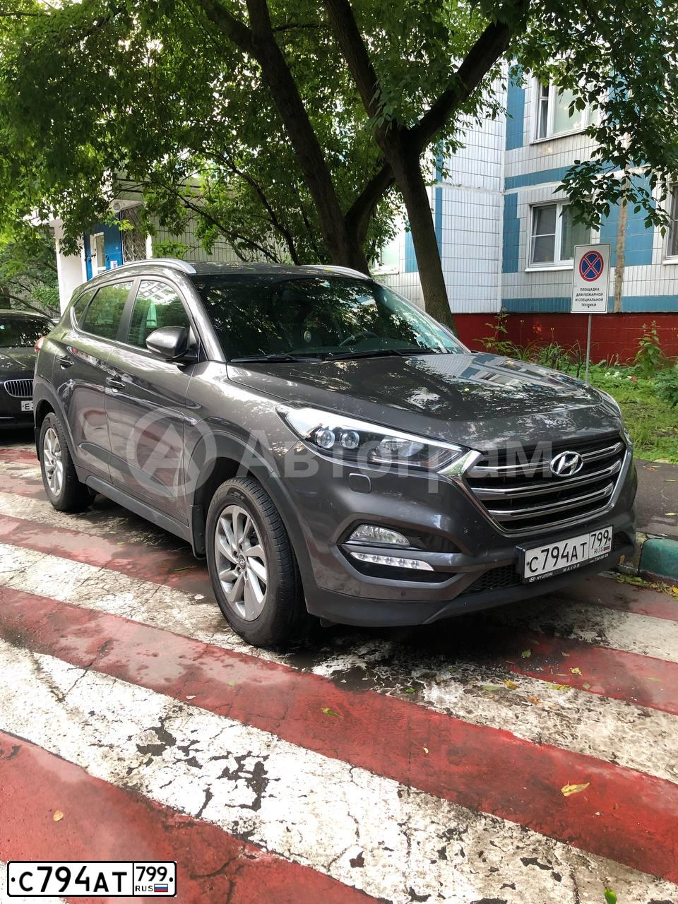 Фото автомобиля HYUNDAI TUCSON, 2017 — госномер С794АТ799. Цвет: КОРИЧНЕВЫЙ