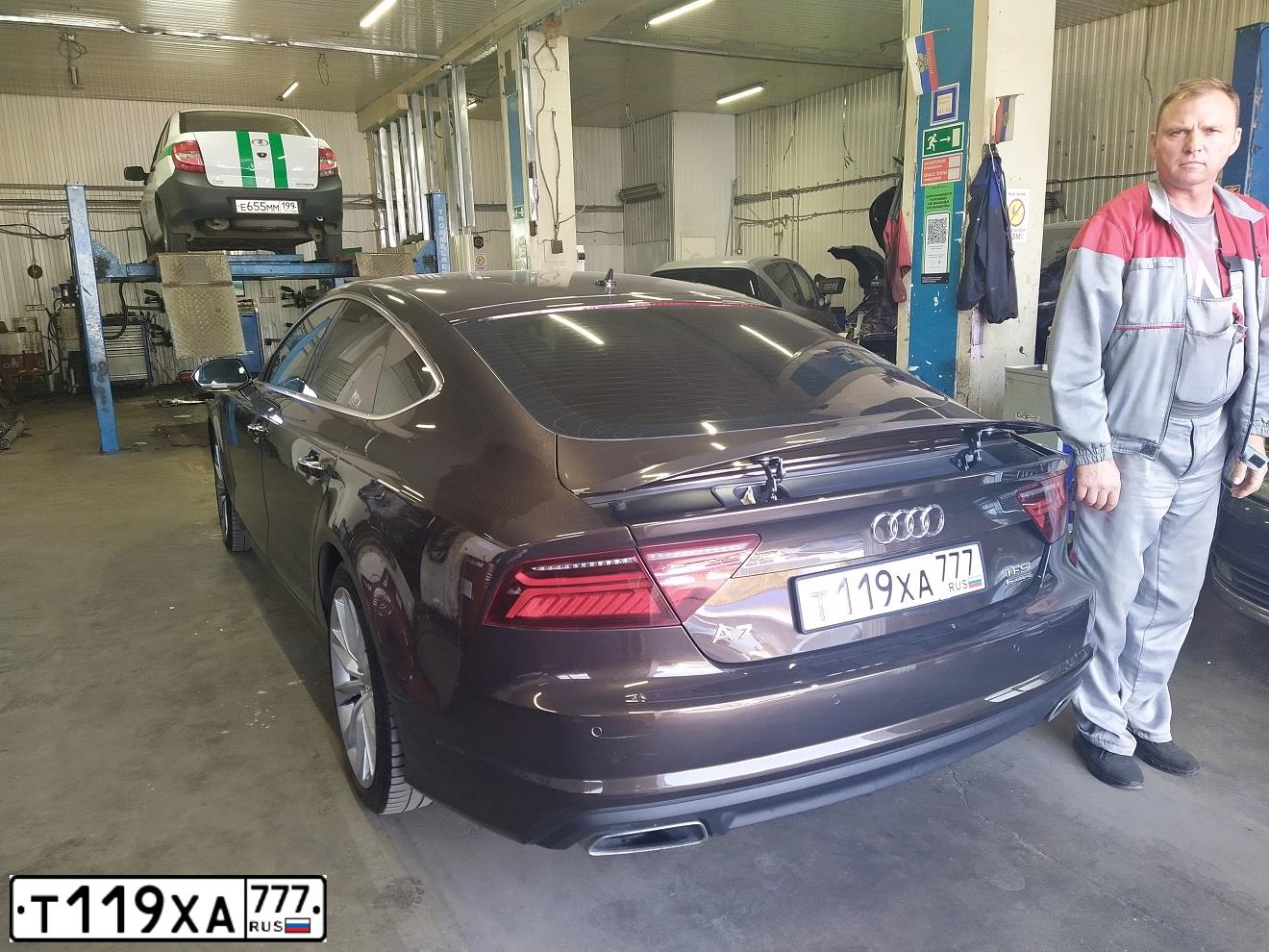 Фото автомобиля AUDI A7, 2016 — госномер В730ЕЕ977. Цвет: Коричневый