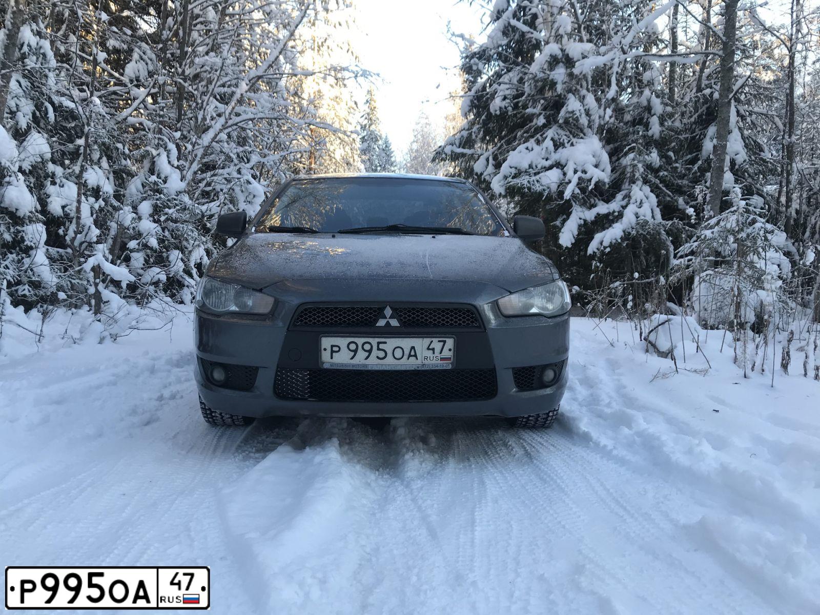 Фото автомобиля MITSUBISHI LANCER, 2008 — госномер Е507АВ977. Цвет: СЕРЫЙ