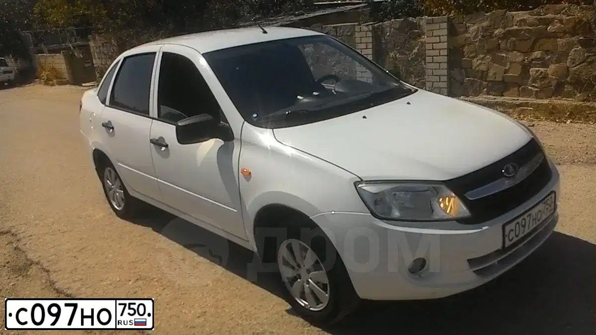 Фото автомобиля LADA GRANTA, 2014 — госномер Р101НВ32