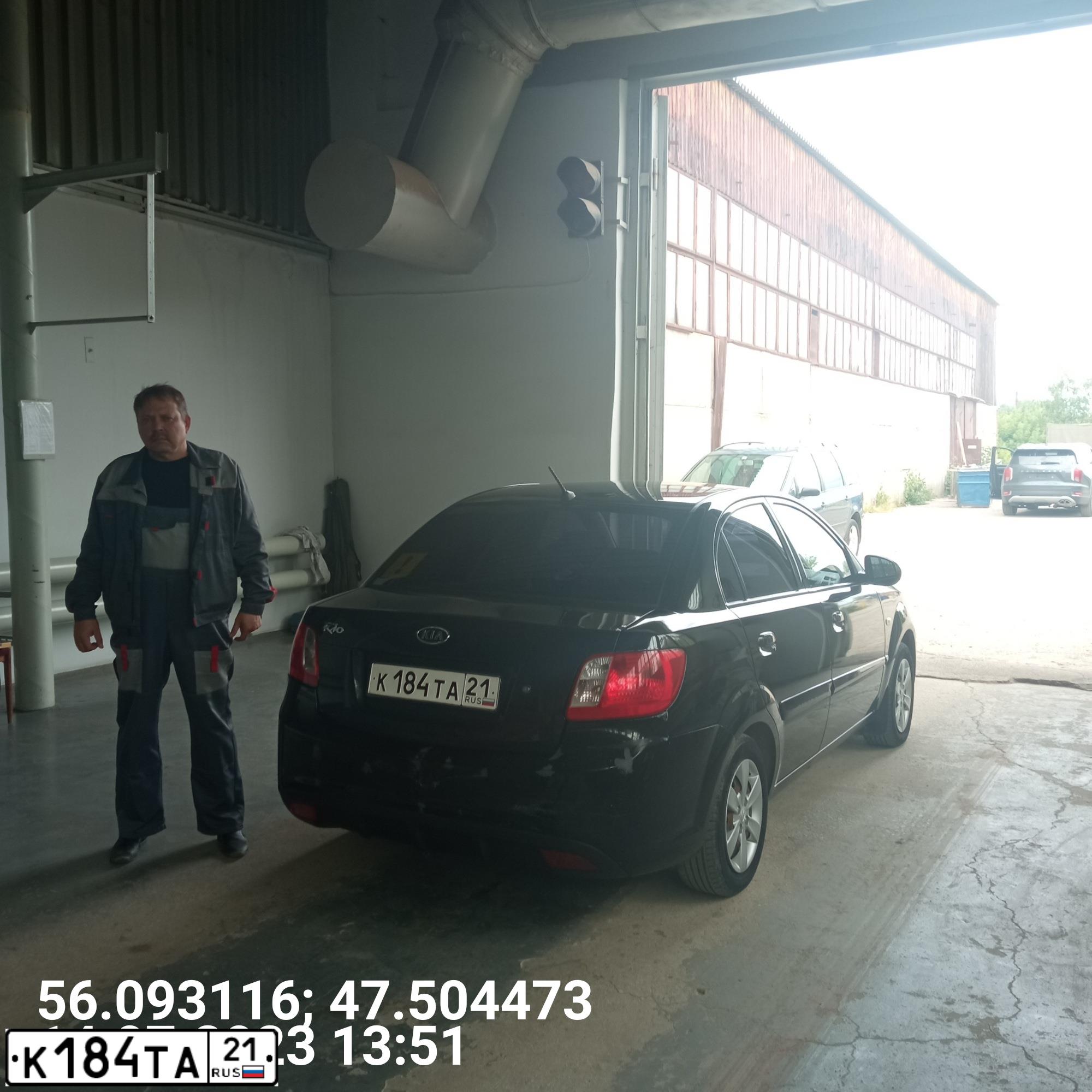 Фото автомобиля KIA RIO, 2011 — госномер К184ТА21. Цвет: ЧЕРНЫЙ