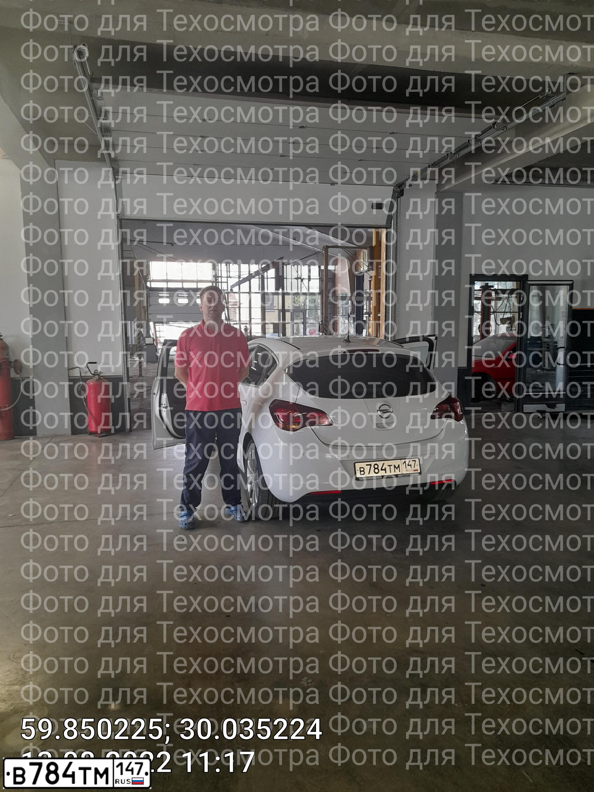 Фото автомобиля OPEL ASTRA, 2011 — госномер Х838РН31. Цвет: Белый