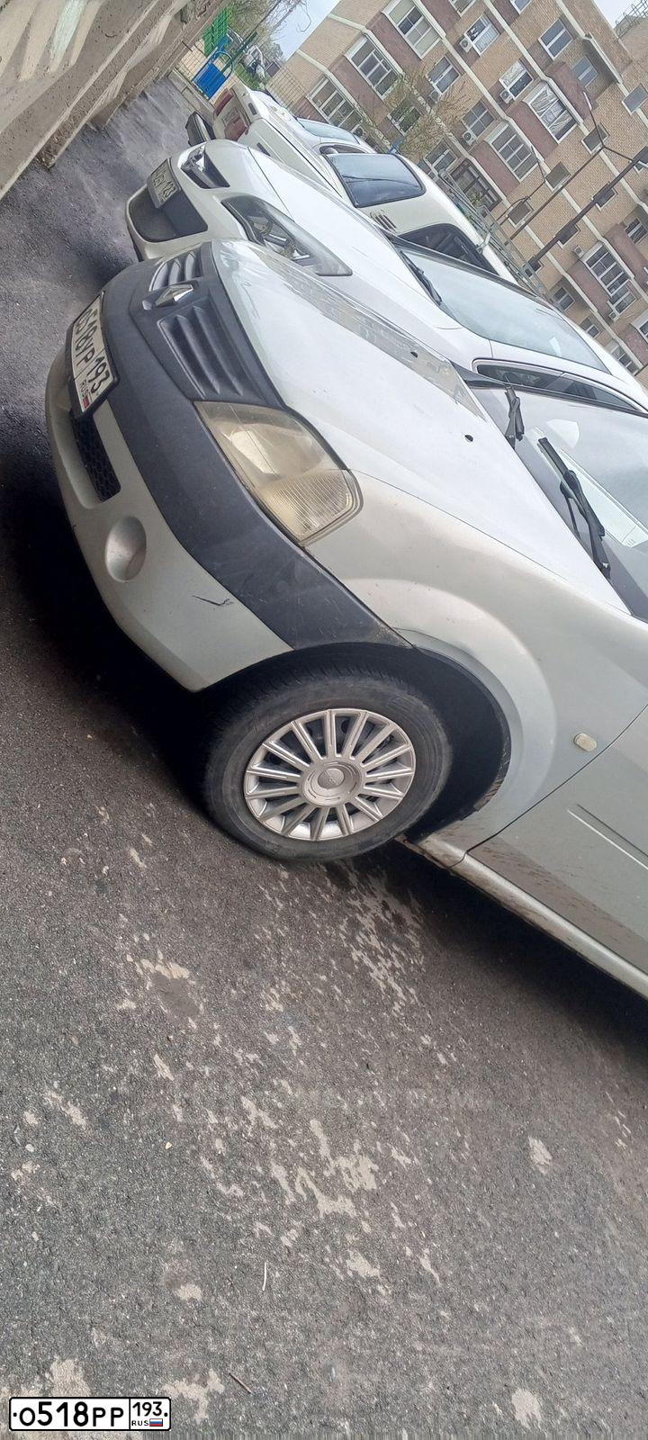 Фото автомобиля MITSUBISHI LANCER, 2004 — госномер Е958НМ193