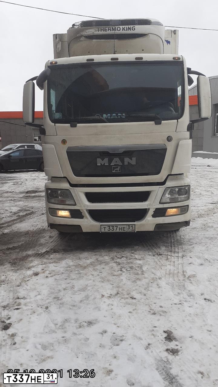 Фото автомобиля MAN TGS 26.XXX /6X2/, 2011 — госномер Т337НЕ31. Цвет: Белый