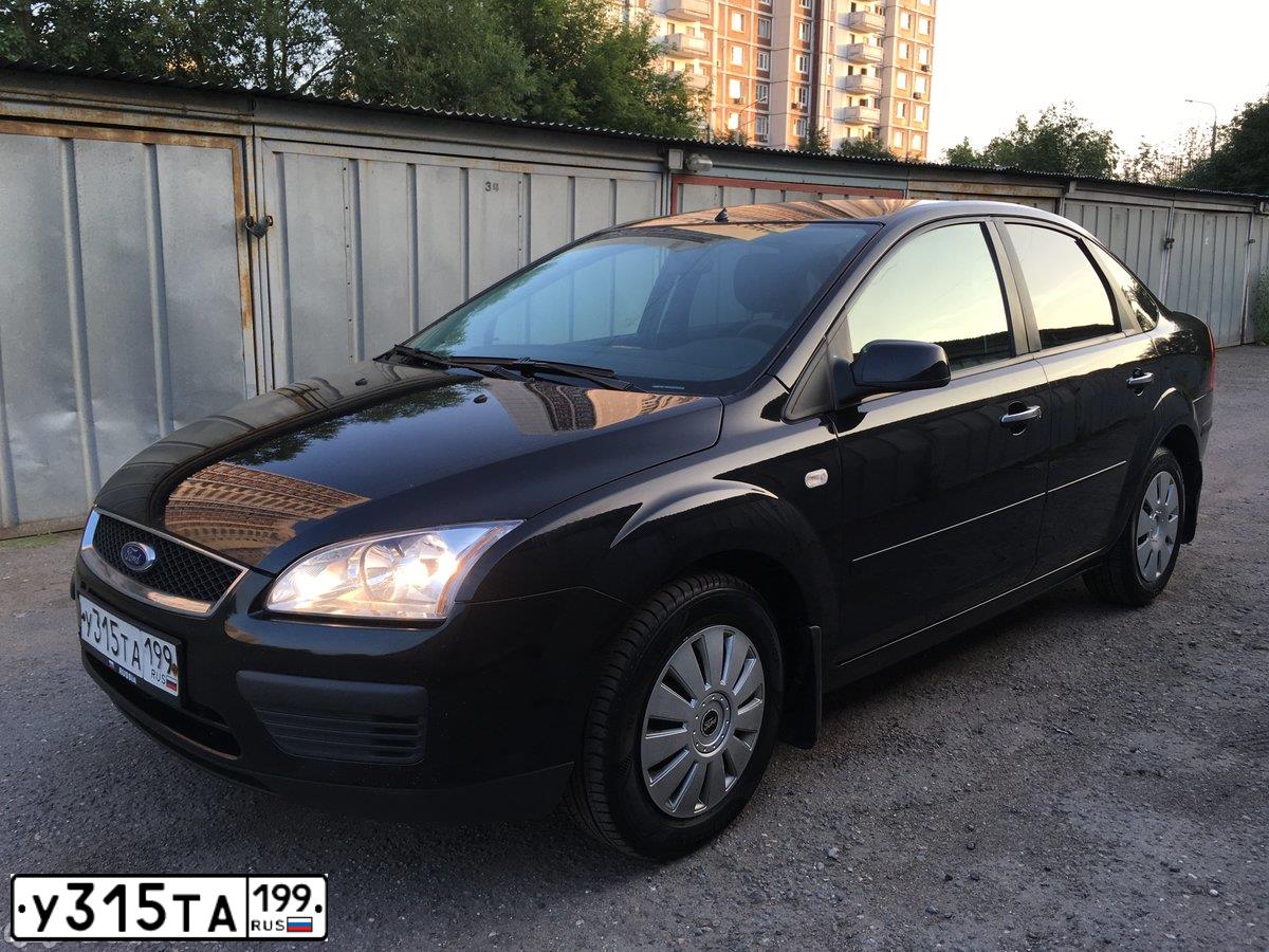 Фото автомобиля FORD FOCUS, 2007 — госномер Е169НН30. Цвет: ЧЕРНЫЙ