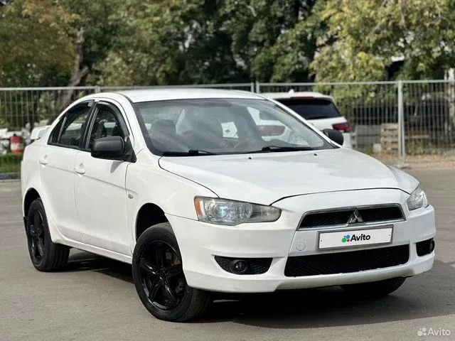 Фото автомобиля MITSUBISHI LANCER, 2007 — госномер А459ОО790. Цвет: Белый