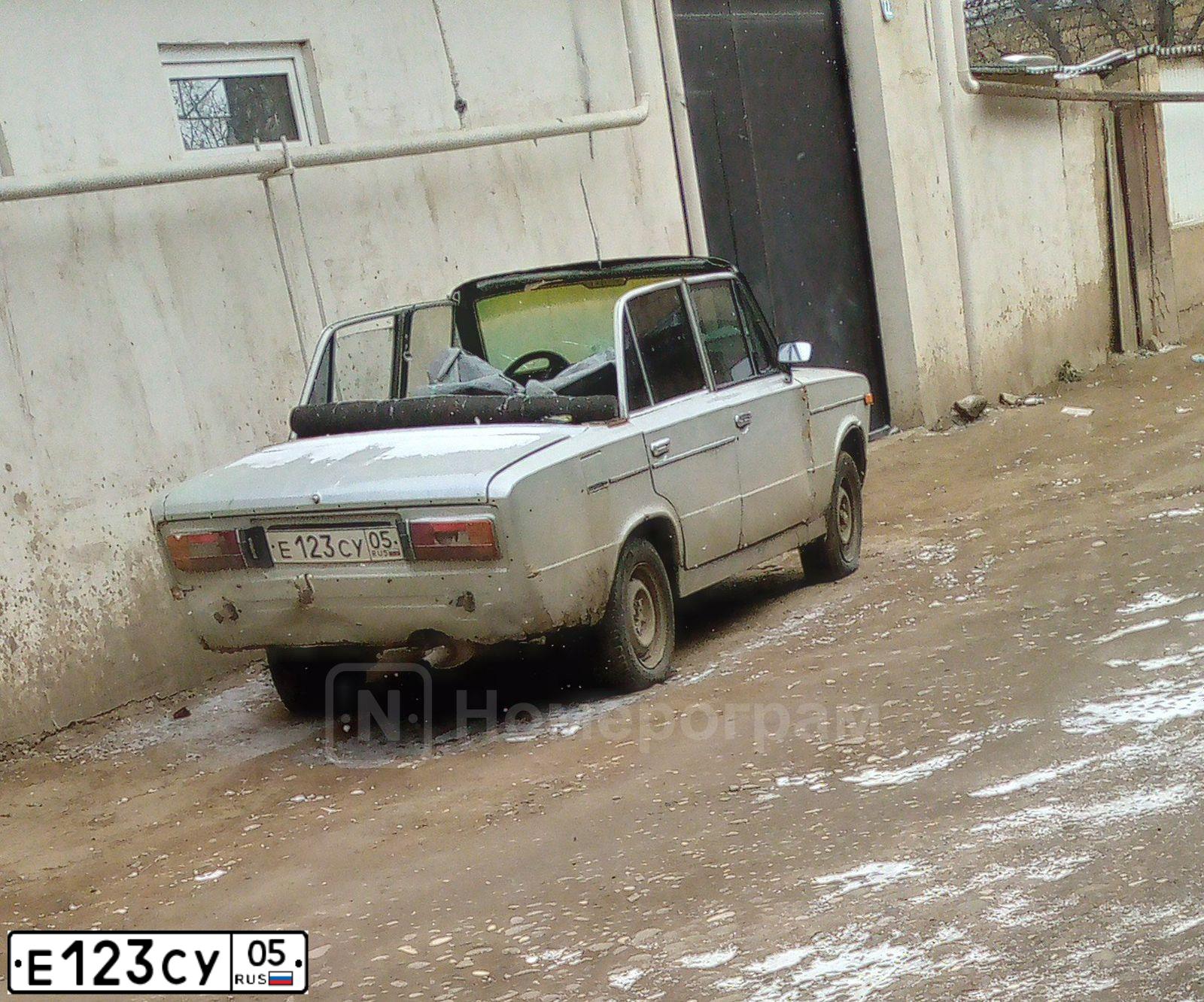 Фото автомобиля LADA 2106, 1997 — госномер Е123СУ05. Цвет: СЕРЕБР.ЖЕЛТО-ЗЕЛЕНЫЙ