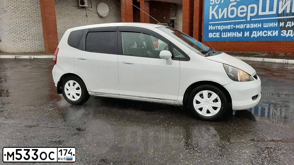 Фото автомобиля LADA 2172 PRIORA, 2011 — госномер Н533ОС174. Цвет: ЗЕЛЕНЫЙ