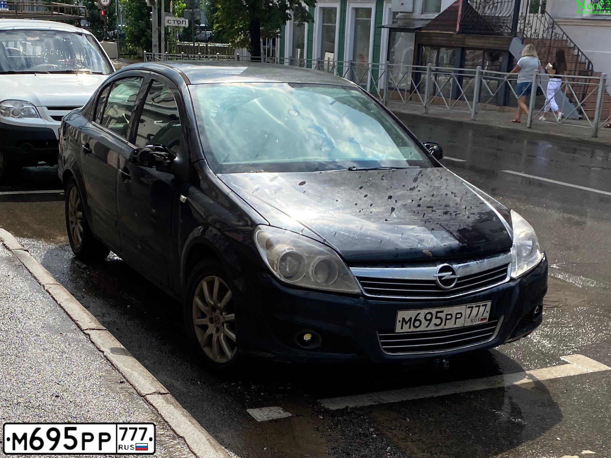 Фото автомобиля OPEL ASTRA, 2008 — госномер М695РР777. Цвет: ЧЕРНЫЙ