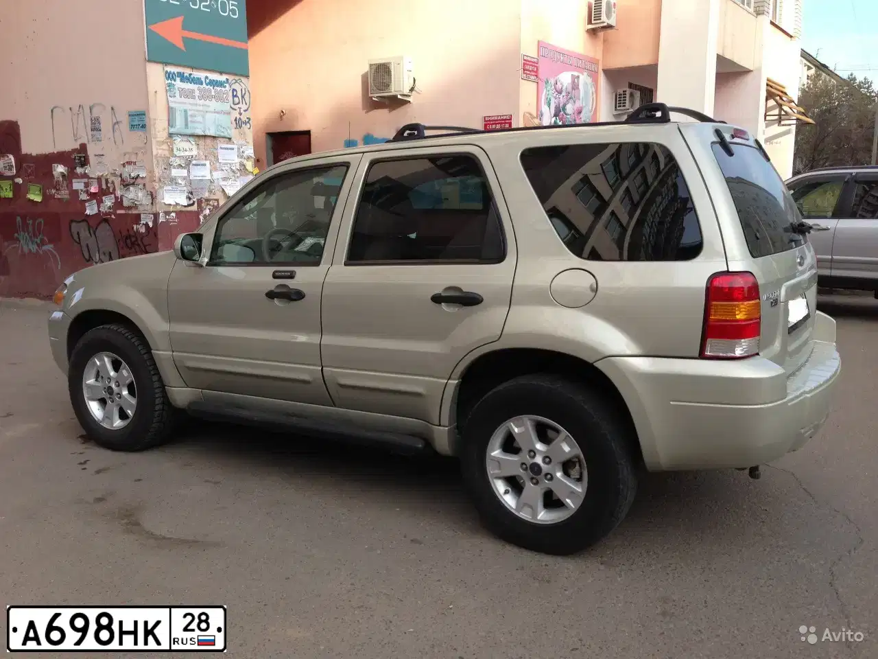 Фото автомобиля FORD ESCAPE, 2004 — госномер К280СА28. Цвет: ЗОЛОТИСТЫЙ