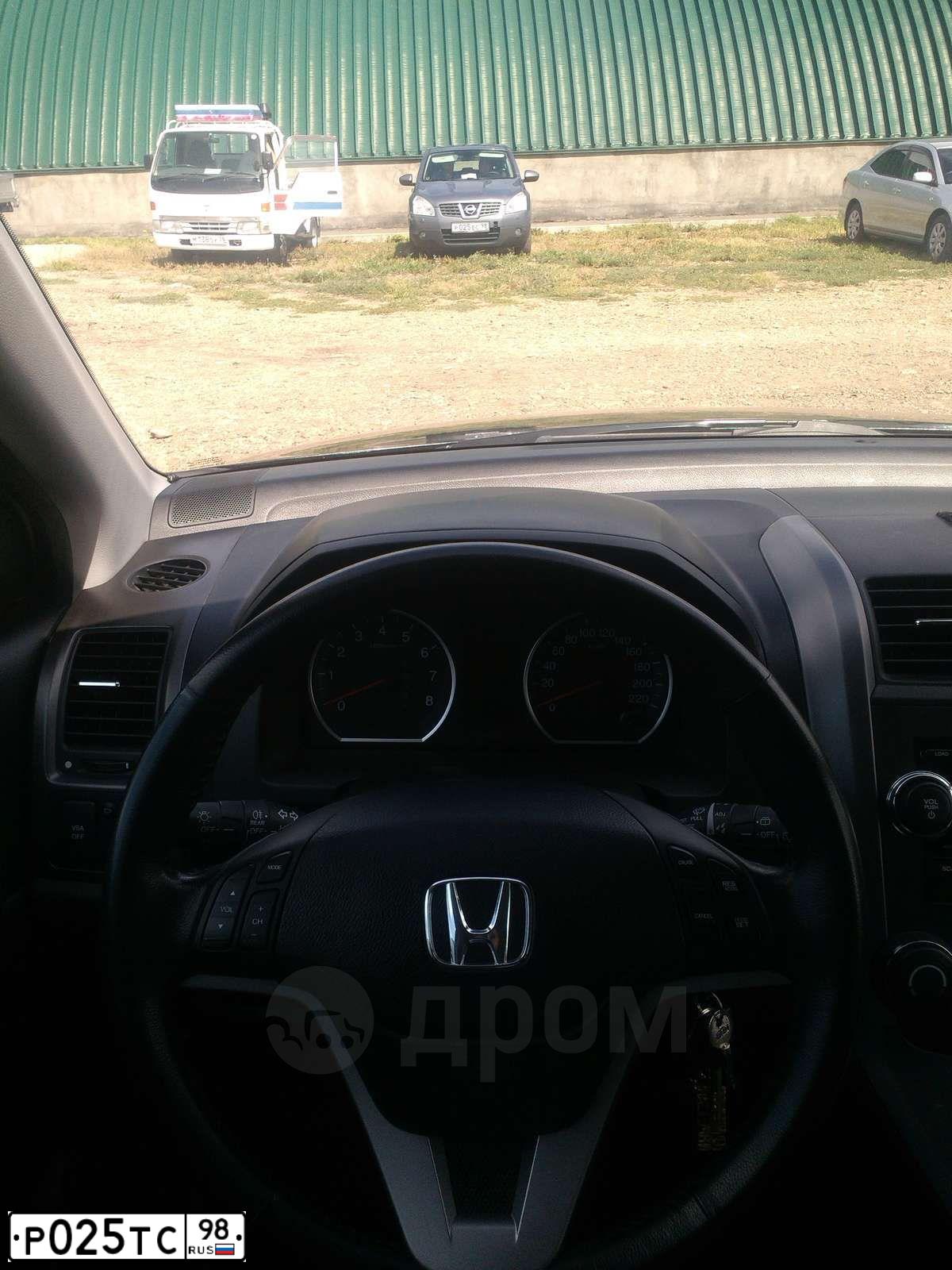 Фото автомобиля HYUNDAI GETZ, 2007 — госномер Р025ТС98. Цвет: КРАСНЫЙ