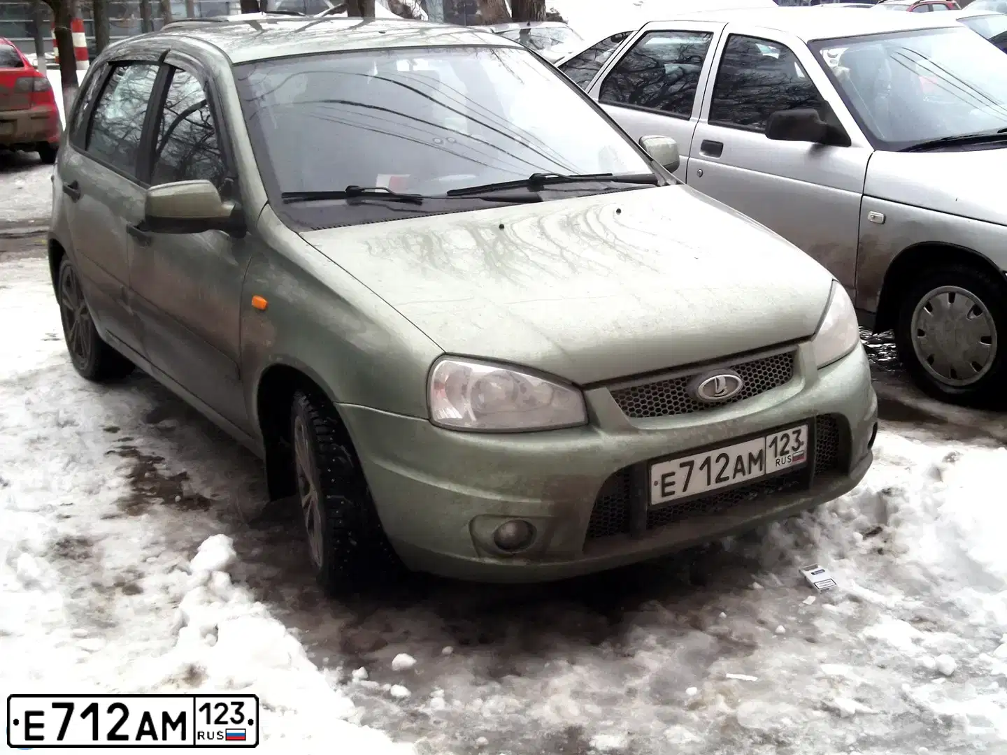 Фото автомобиля LADA 1119 KALINA, 2011 — госномер Е712АМ123. Цвет: СВЕТЛО-ЗЕЛЕНЫЙ