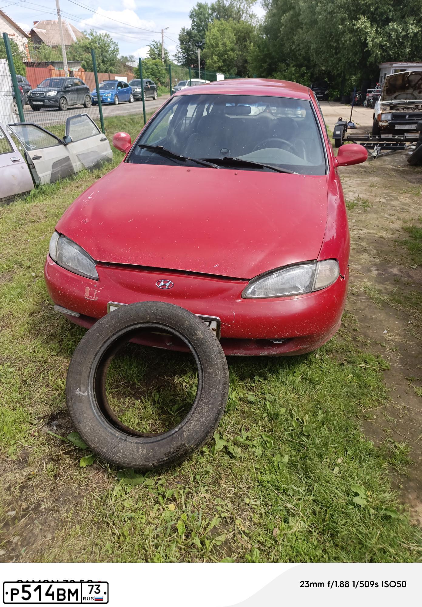 Фото автомобиля HYUNDAI ELANTRA, 1996 — госномер Н412УТ197. Цвет: КРАСНЫЙ