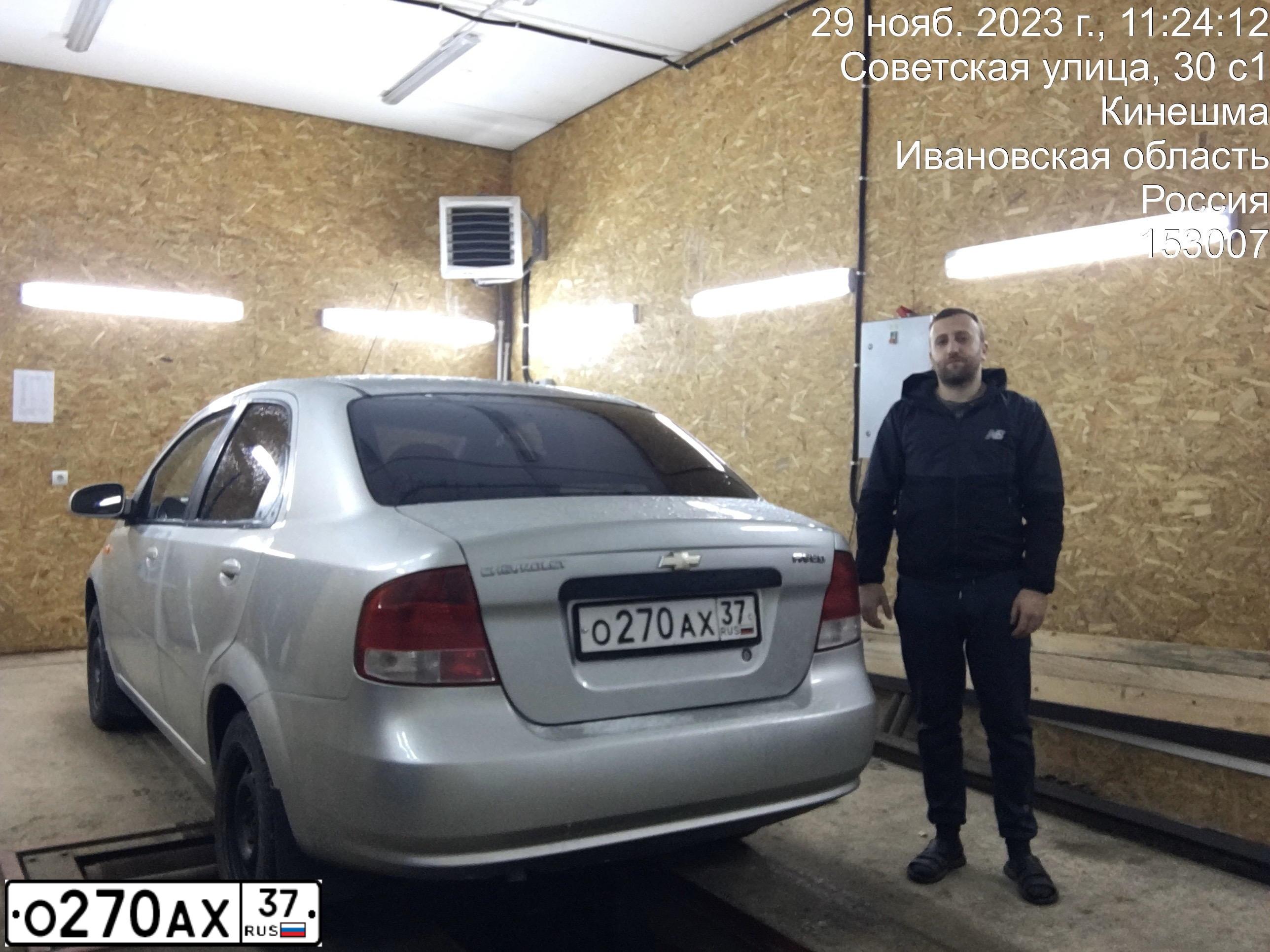 Фото автомобиля CHEVROLET AVEO, 2005 — госномер О270АХ37. Цвет: Серебристый