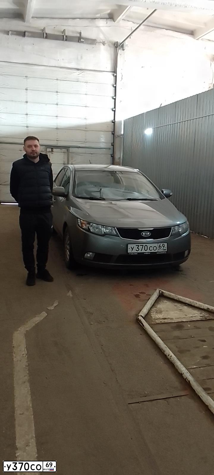 Фото автомобиля KIA CERATO, 2009 — госномер У370СО69. Цвет: Серый