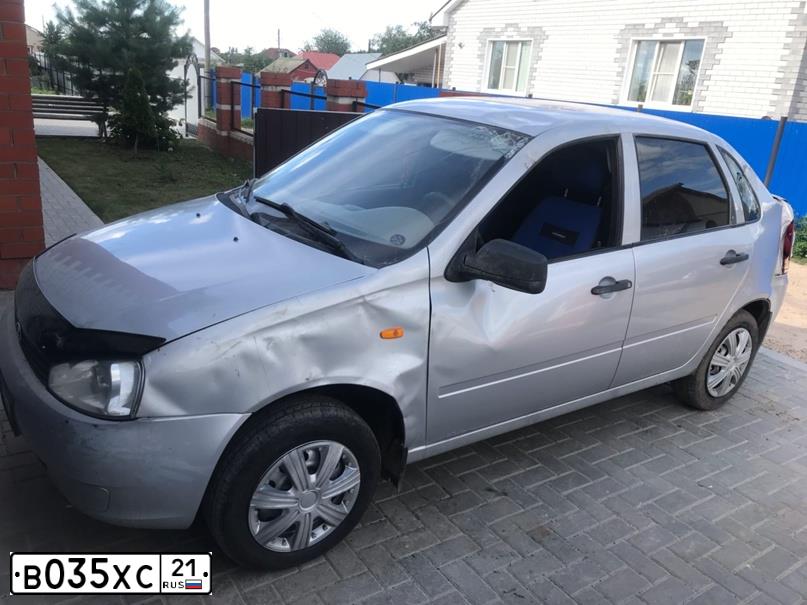 Фото автомобиля LADA 1118 KALINA, 2010 — госномер В035ХС21. Цвет: Серебристый