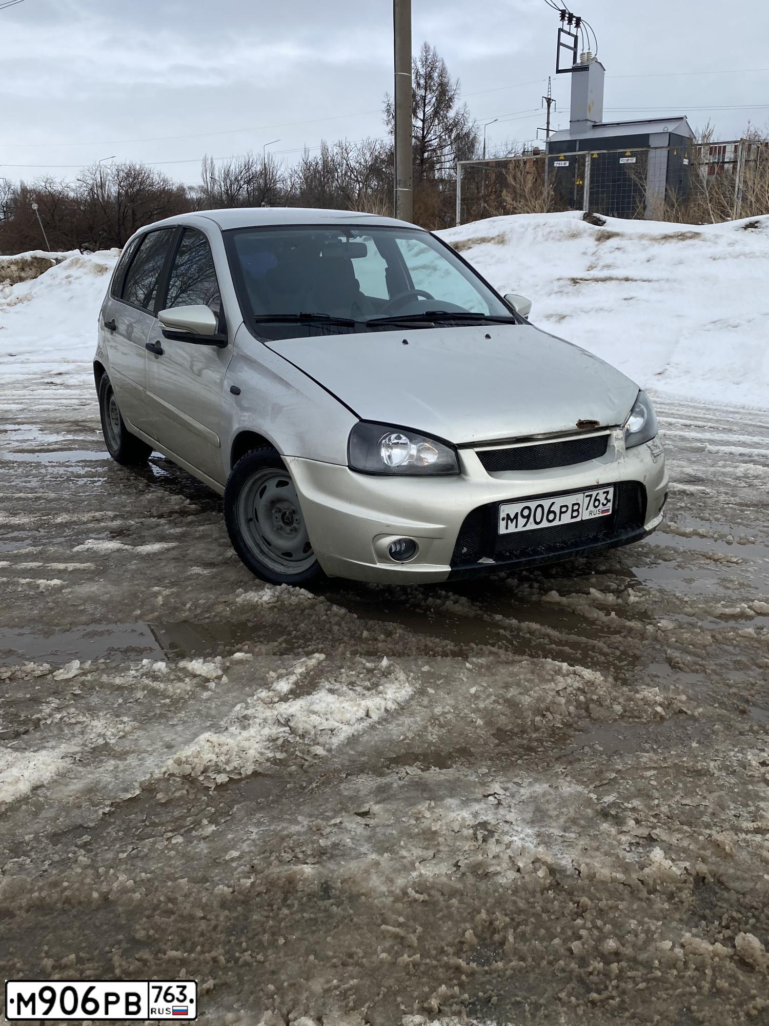 Фото автомобиля LADA KALINA, 2011 — госномер Н898ТА73. Цвет: БЕЛО-ЖЕЛТЫЙ ПЕРЛАМУТРОВЫЙ