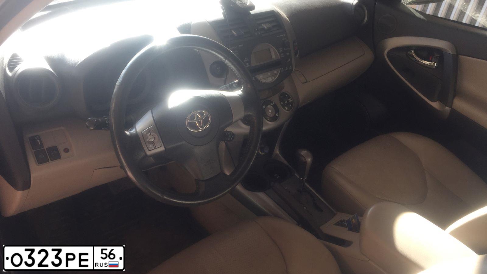 Фото автомобиля TOYOTA RAV4, 2007 — госномер О323РЕ56. Цвет: ЧЕРНЫЙ