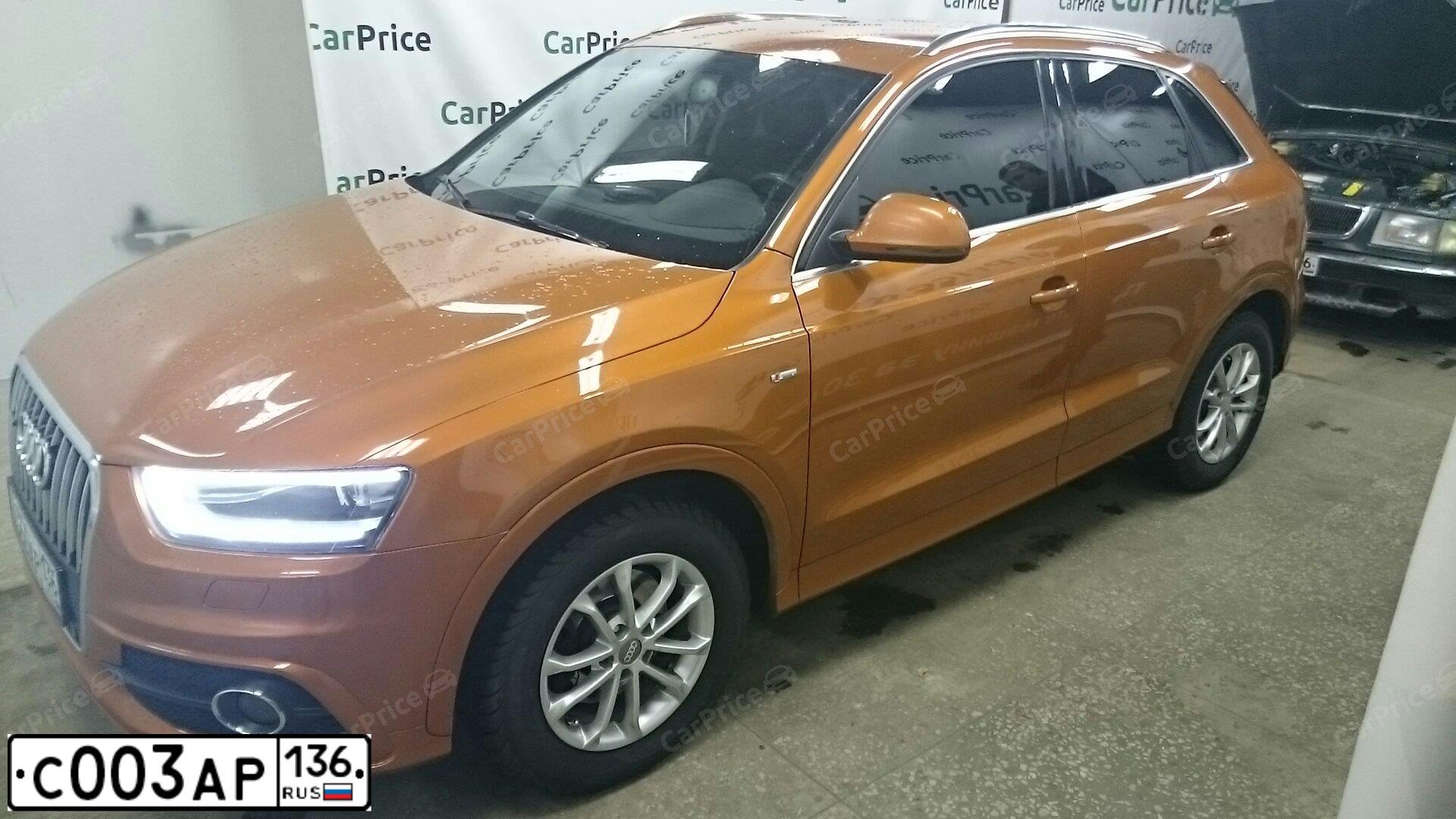 Фото автомобиля AUDI Q3, 2013 — госномер С003АР136. Цвет: Оранжевый