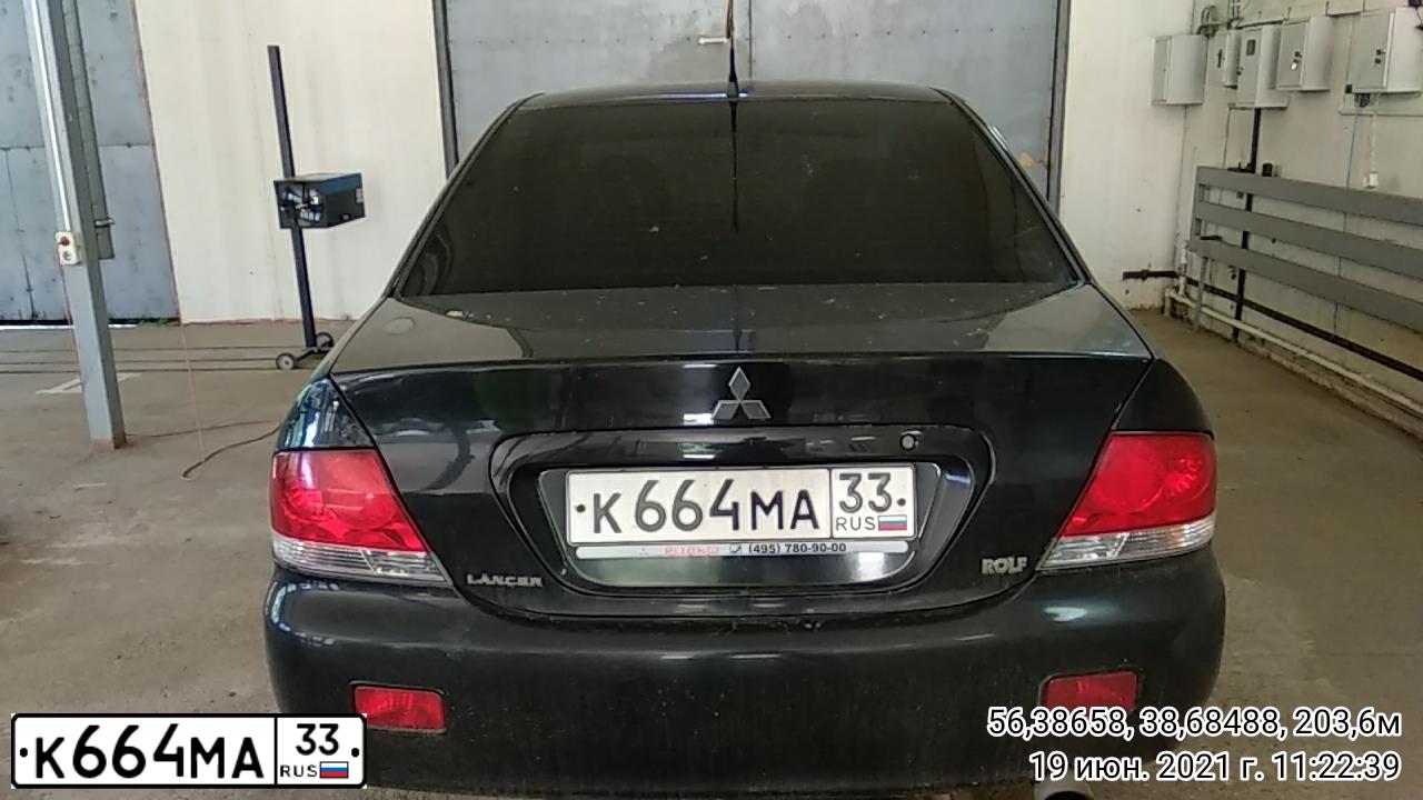 Фото автомобиля MITSUBISHI LANCER, 2006 — госномер К664МА33. Цвет: ЧЕРНЫЙ