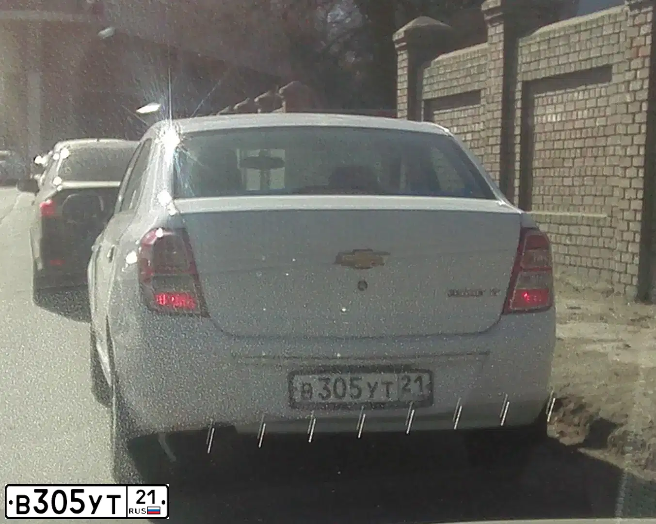 Фото автомобиля CHEVROLET COBALT, 2013 — госномер В305УТ21. Цвет: Белый