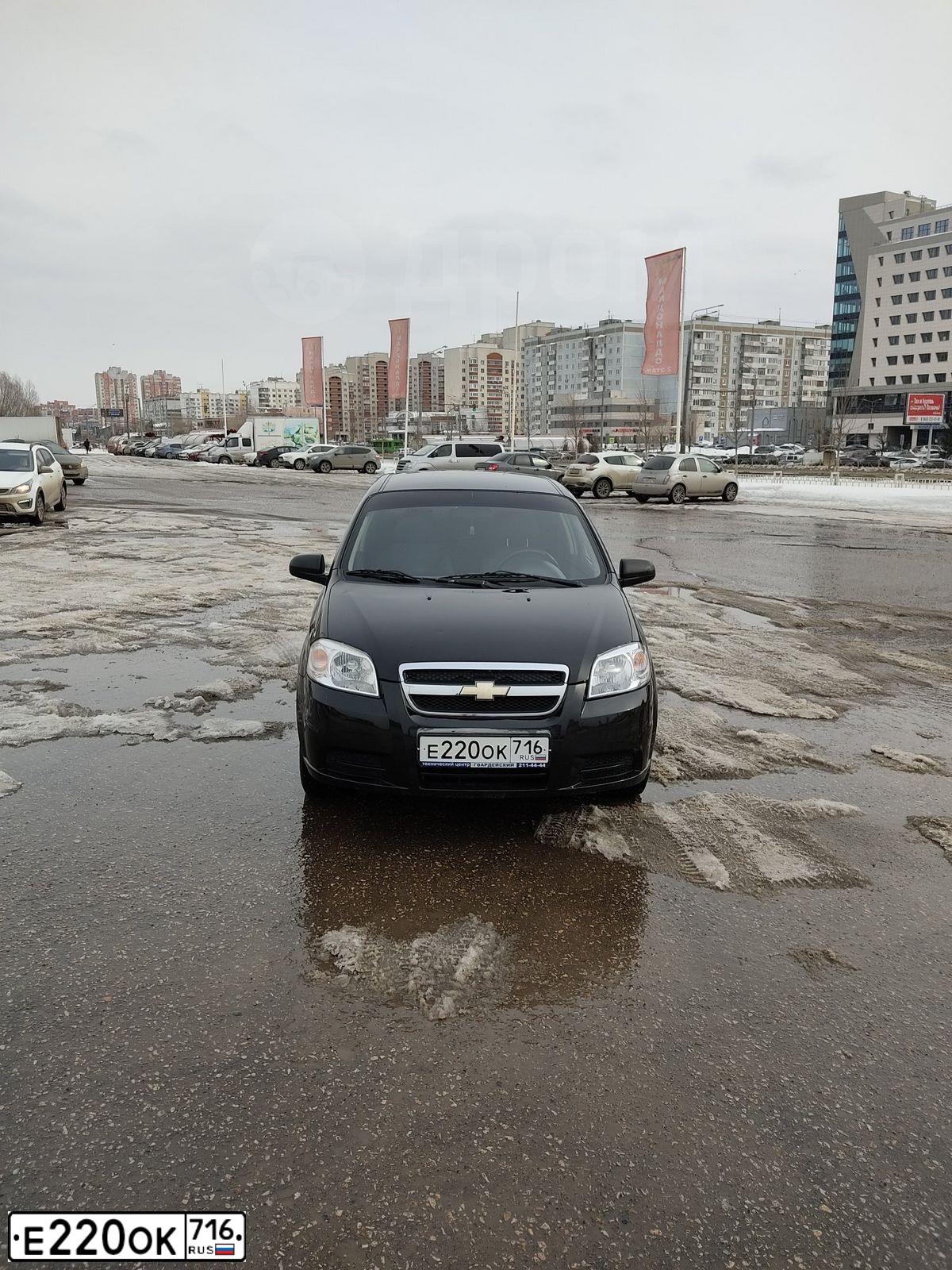 Фото автомобиля CHEVROLET AVEO, 2007 — госномер Е220ОК716. Цвет: ЧЕРНЫЙ