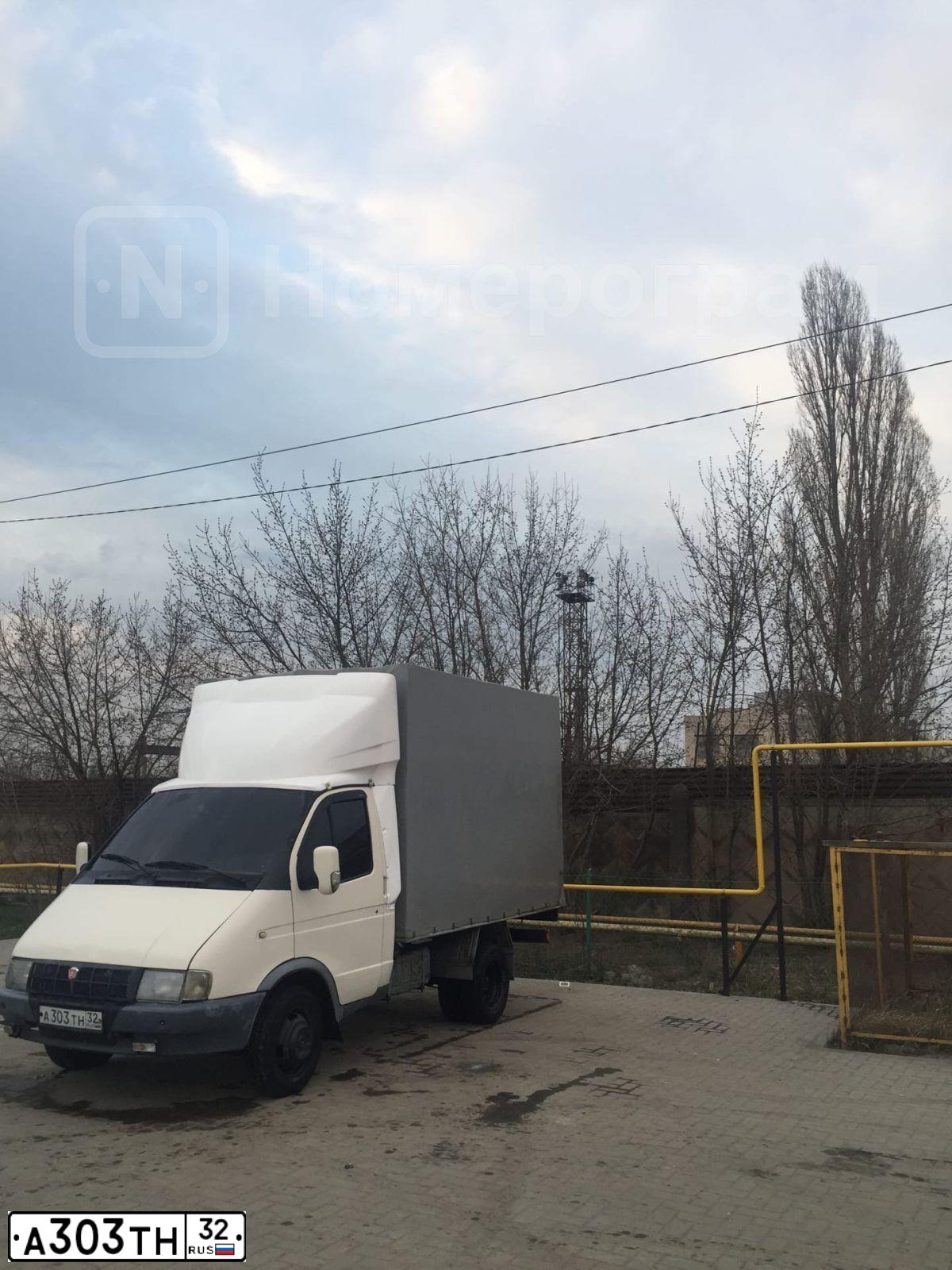 Фото автомобиля GAZ Z 3302 GAZEL, 1999 — госномер А303ТН32. Цвет: СЕРО-БЕЛЫЙ
