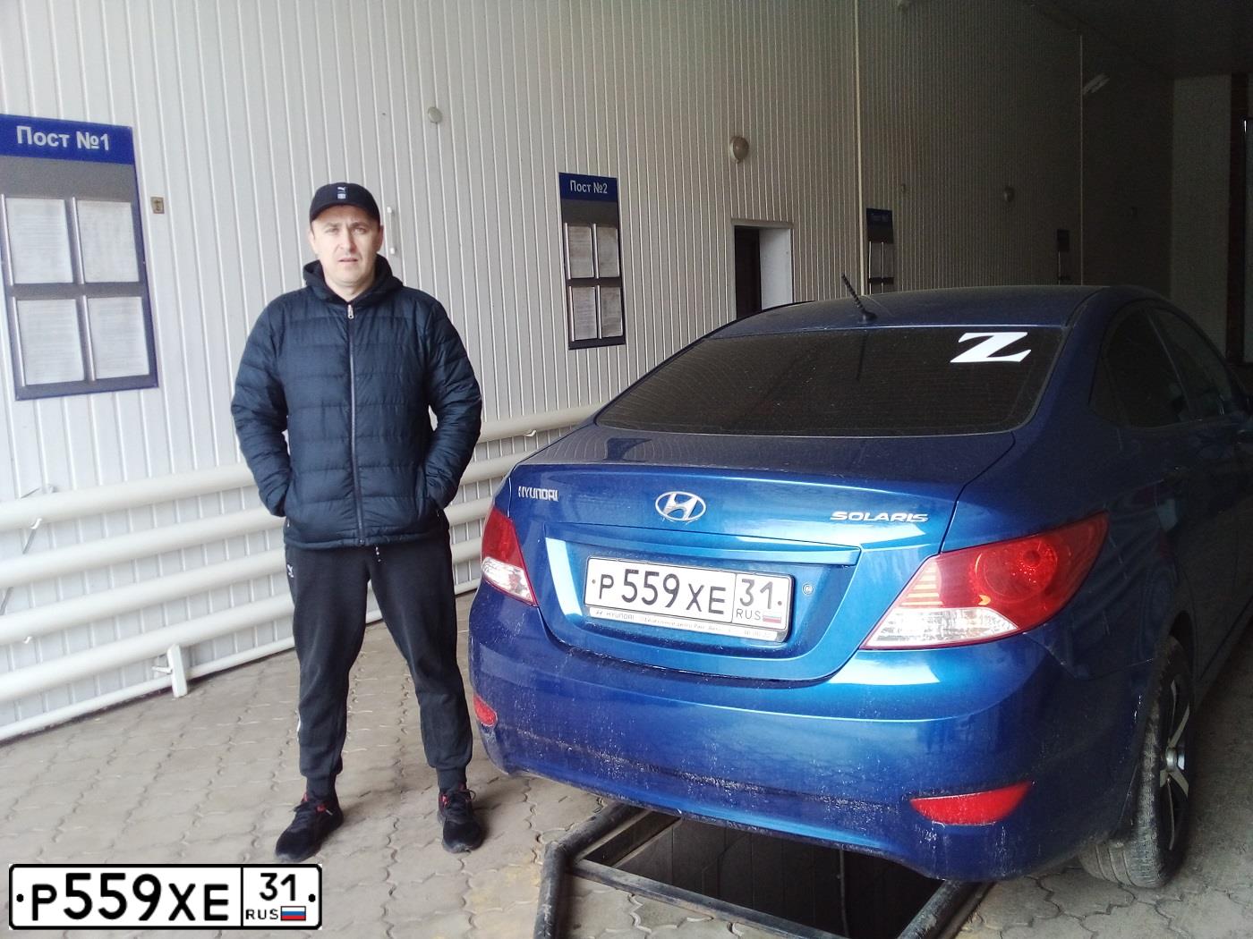 Фото автомобиля HYUNDAI SOLARIS, 2012 — госномер Р559ХЕ31. Цвет: ТЕМНО СИНИЙ
