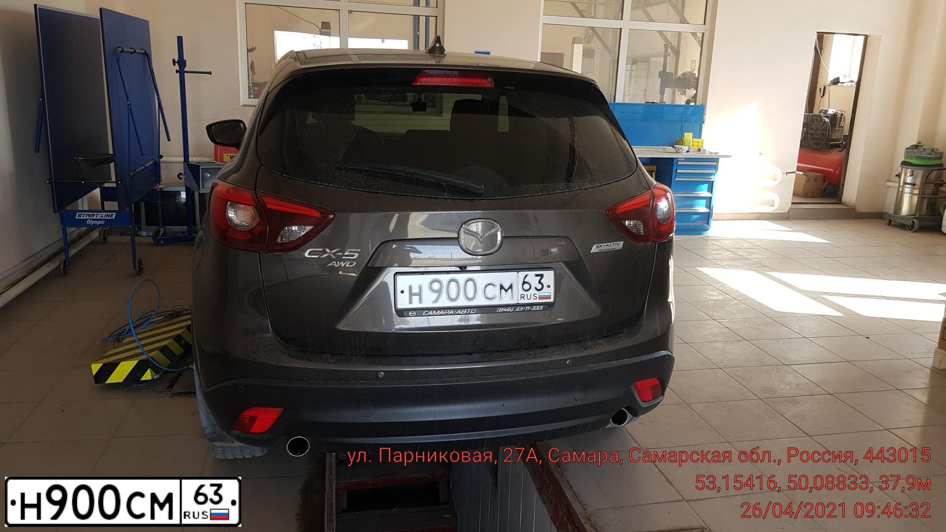 Фото автомобиля HYUNDAI IX35, 2011 — госномер Е307ЕС70. Цвет: ТЕМНО-СЕРЫЙ