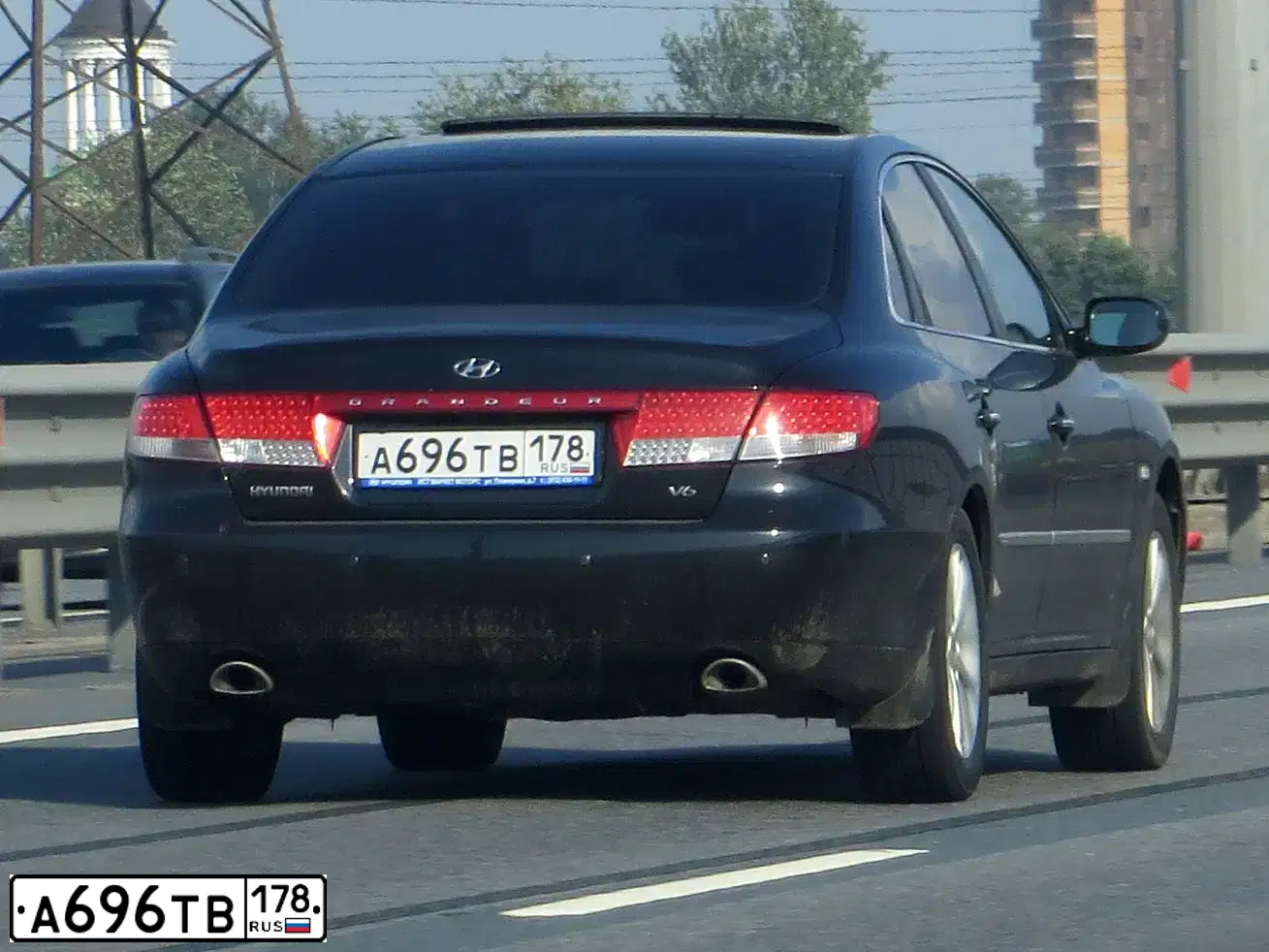 Фото автомобиля HYUNDAI GRANDEUR, 2008 — госномер А696ТВ178. Цвет: ЧЕРНЫЙ