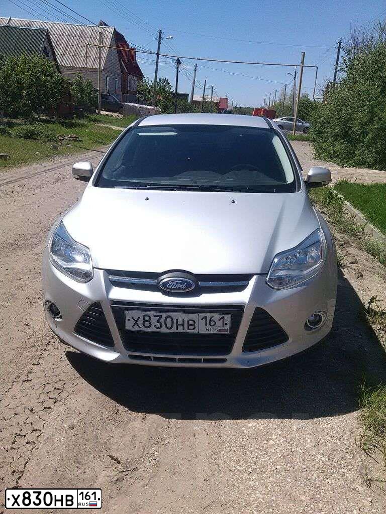 Фото автомобиля FORD FOCUS, 2011 — госномер Р767СА161. Цвет: БЕЛЫЙ