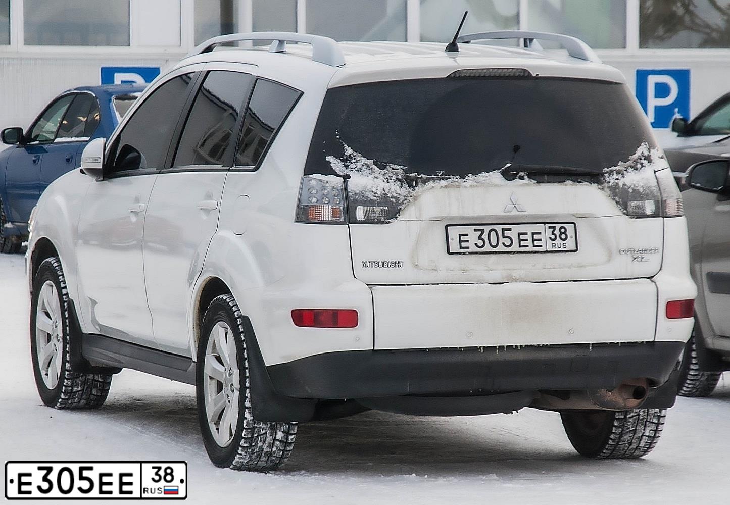 Фото автомобиля MITSUBISHI OUTLANDER, 2010 — госномер О006РВ38. Цвет: Белый