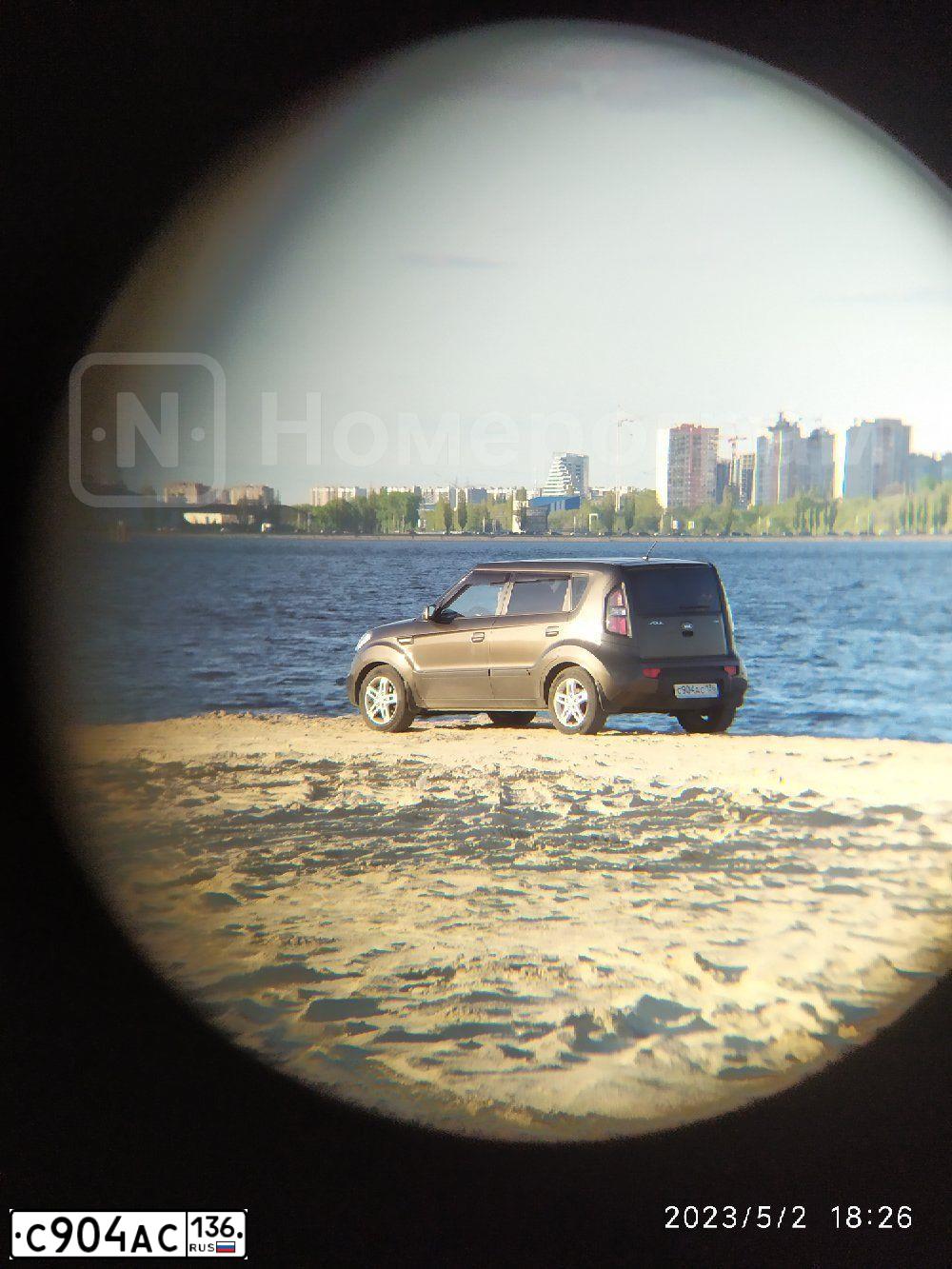 Фото автомобиля KIA SOUL, 2009 — госномер К562КК36. Цвет: Коричневый