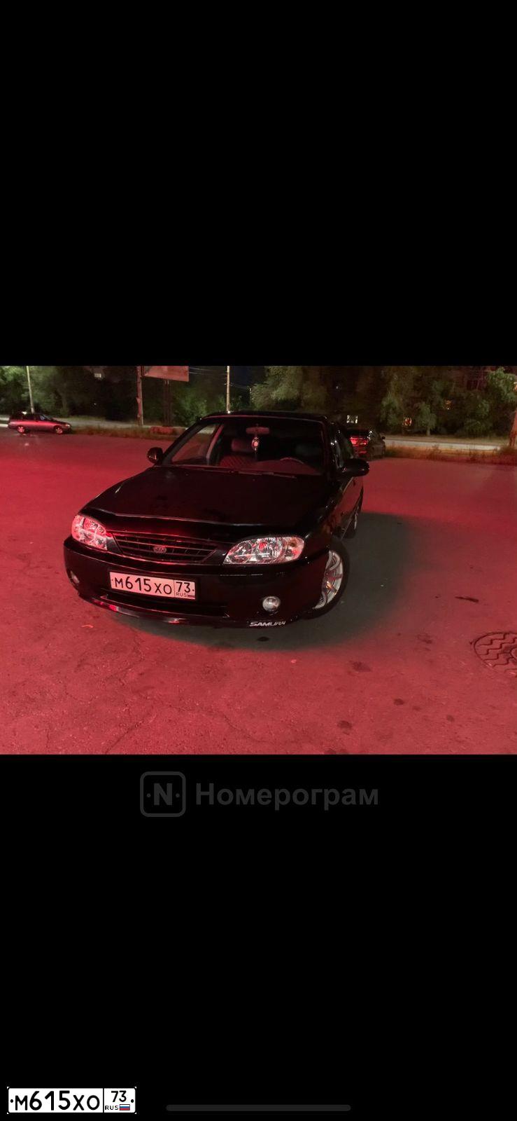 Фото автомобиля KIA SPECTRA, 2008 — госномер М615ХО73. Цвет: ЧЕРНЫЙ ЖЕМЧУГ