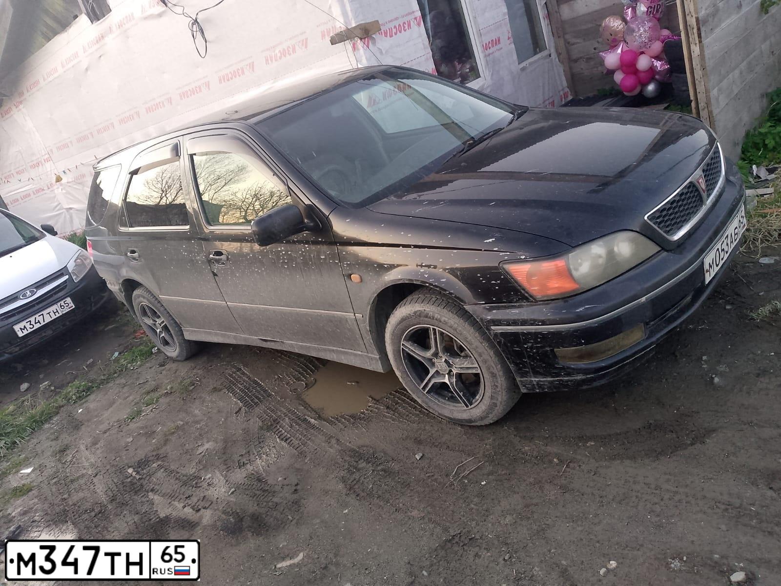 Фото автомобиля LADA 2190 GRANTA, 2015 — госномер М347ТН65. Цвет: Белый