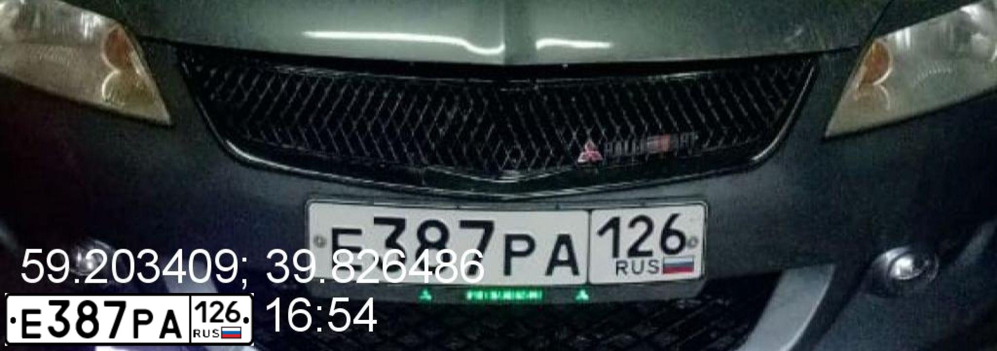 Фото автомобиля MITSUBISHI LANCER, 2004 — госномер У261КТ98. Цвет: Серый