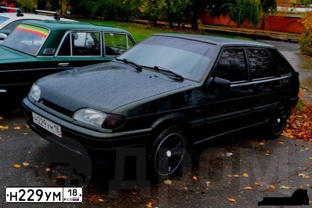 Фото автомобиля LADA 2114 SAMARA, 2006 — госномер Н229УМ18. Цвет: ЗОЛОТИСТЫЙ ТЕМНО-ЗЕЛЕНЫЙ