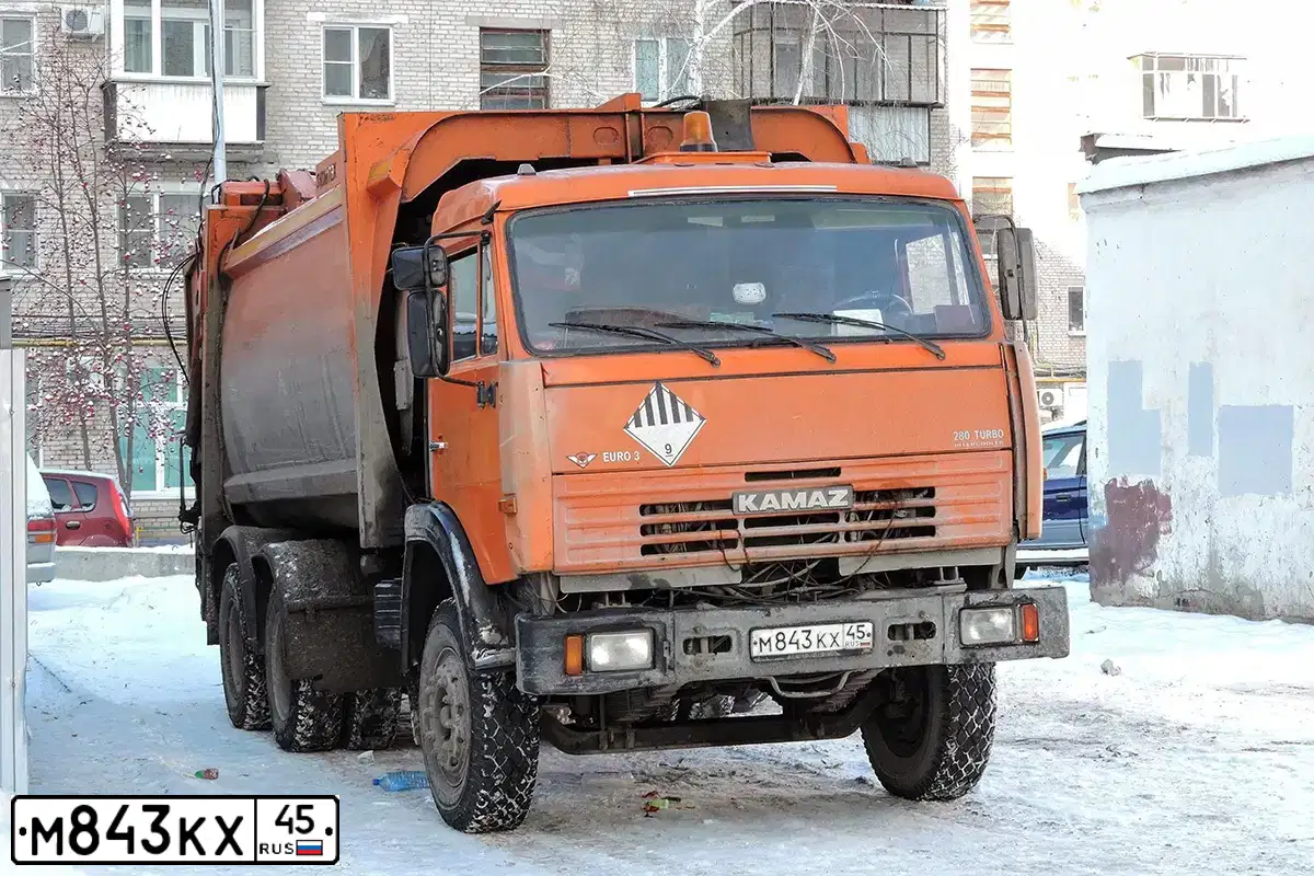 Фото автомобиля KAMAZ 65115 /6X4/, 2010 — госномер М843КХ45. Цвет: ОРАНЖЕВЫЙ