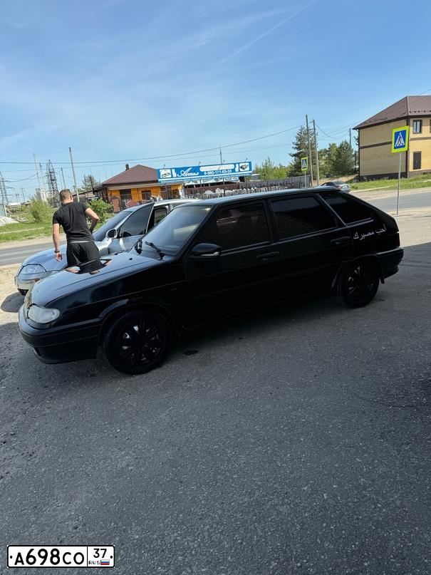 Фото автомобиля LADA 2114 SAMARA, 2012 — госномер Х825НТ37. Цвет: ЧЕРНО-СИНИЙ
