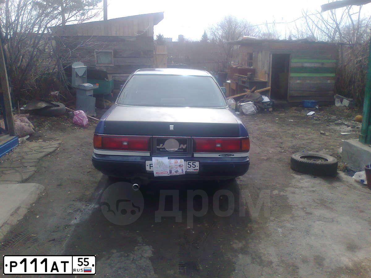 Фото автомобиля TOYOTA LANDCRUISER, 2006 — госномер Е100ЕС96. Цвет: ЧЕРНЫЙ