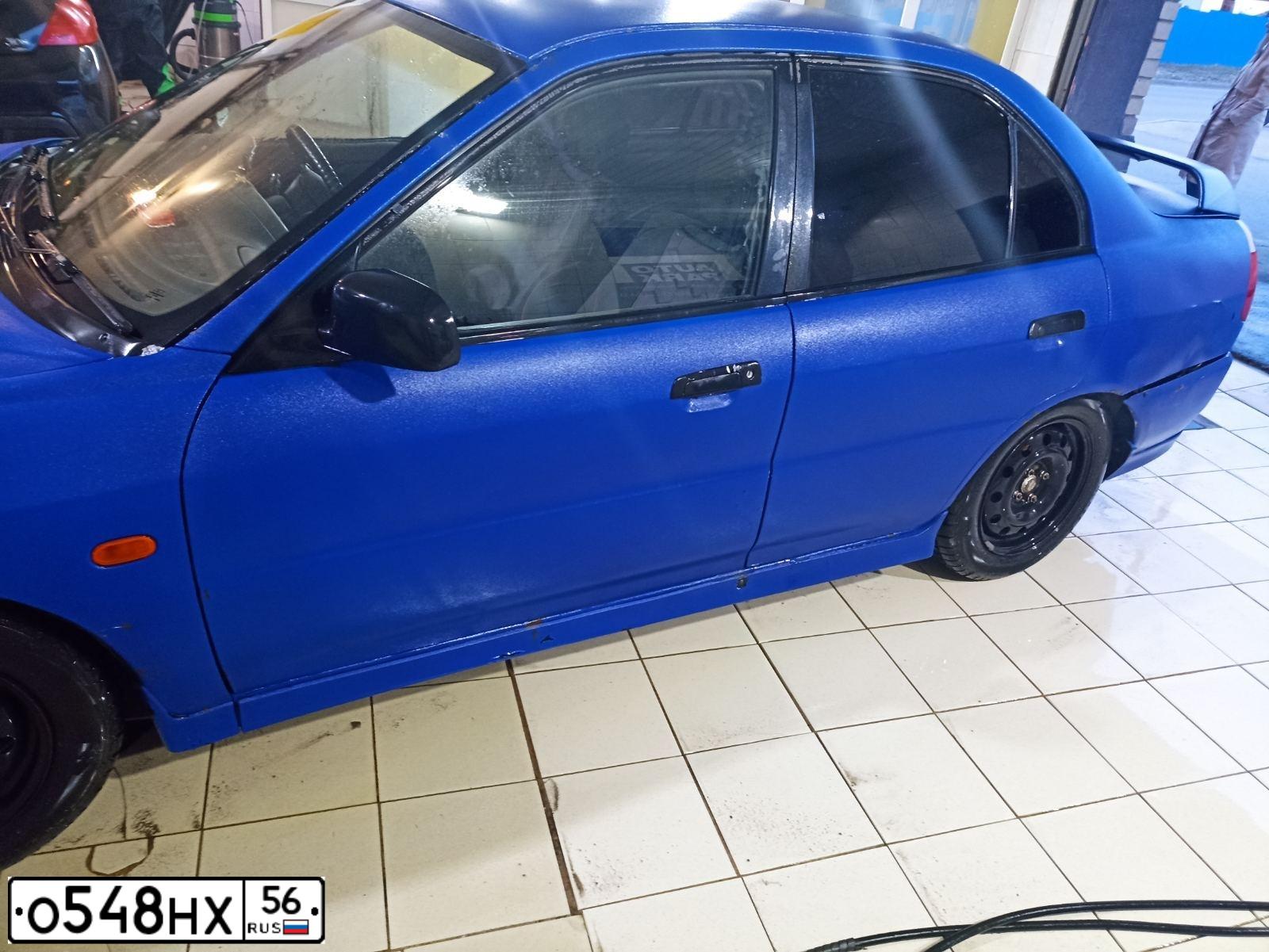 Фото автомобиля MITSUBISHI LANCER, 1997 — госномер В047ОВ156