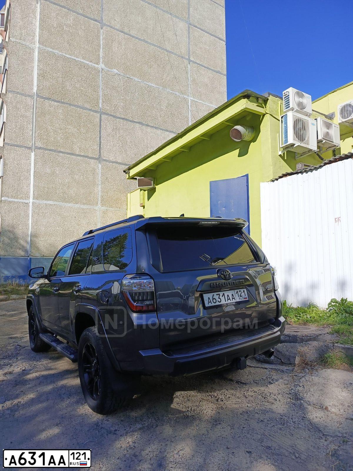 Фото автомобиля KIA SORENTO, 2018 — госномер М573СО21. Цвет: ЧЕРНЫЙ