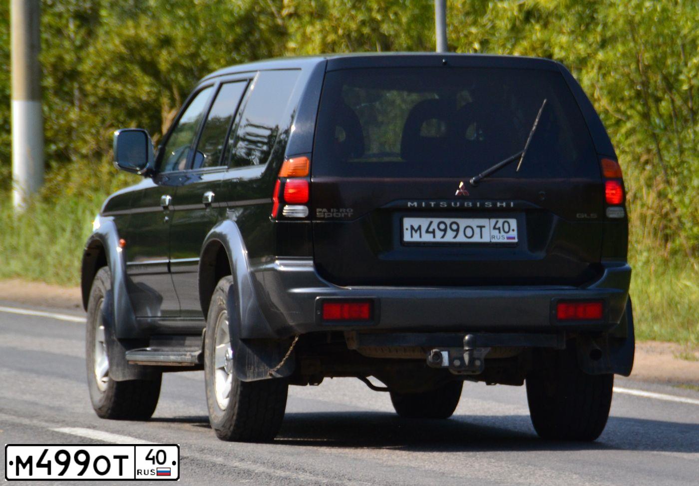 Фото автомобиля MITSUBISHI PAJERO SPORT, 2002 — госномер М499ОТ40. Цвет: ЧЕРНЫЙ
