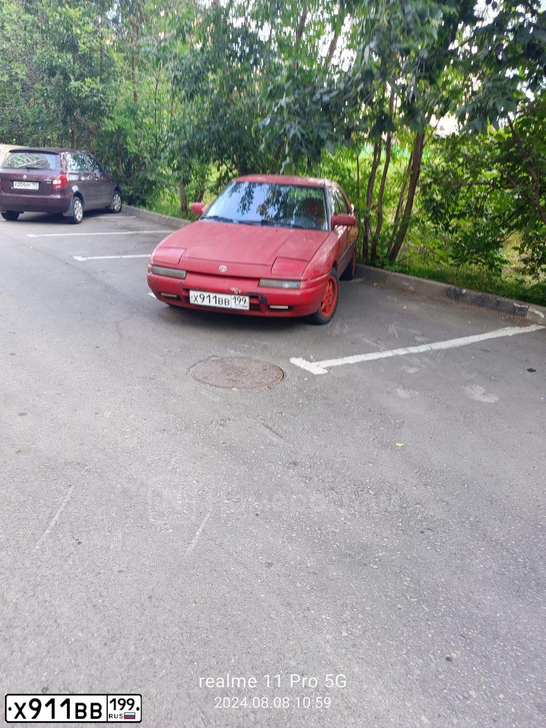 Фото автомобиля MAZDA 323, 1991 — госномер У115НТ177. Цвет: КРАСНЫЙ