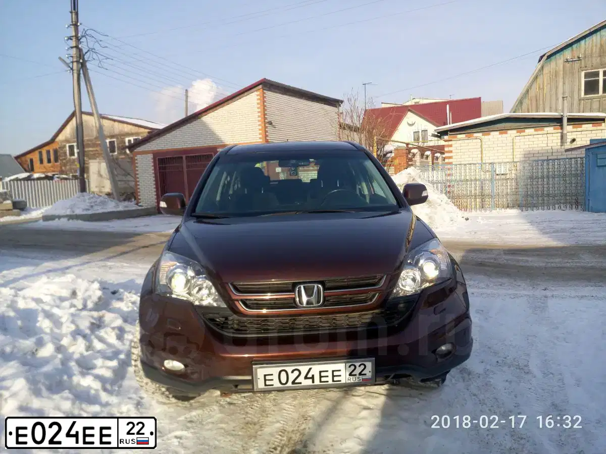 Фото автомобиля HONDA CR-V, 2012 — госномер Е024ЕЕ22. Цвет: Коричневый