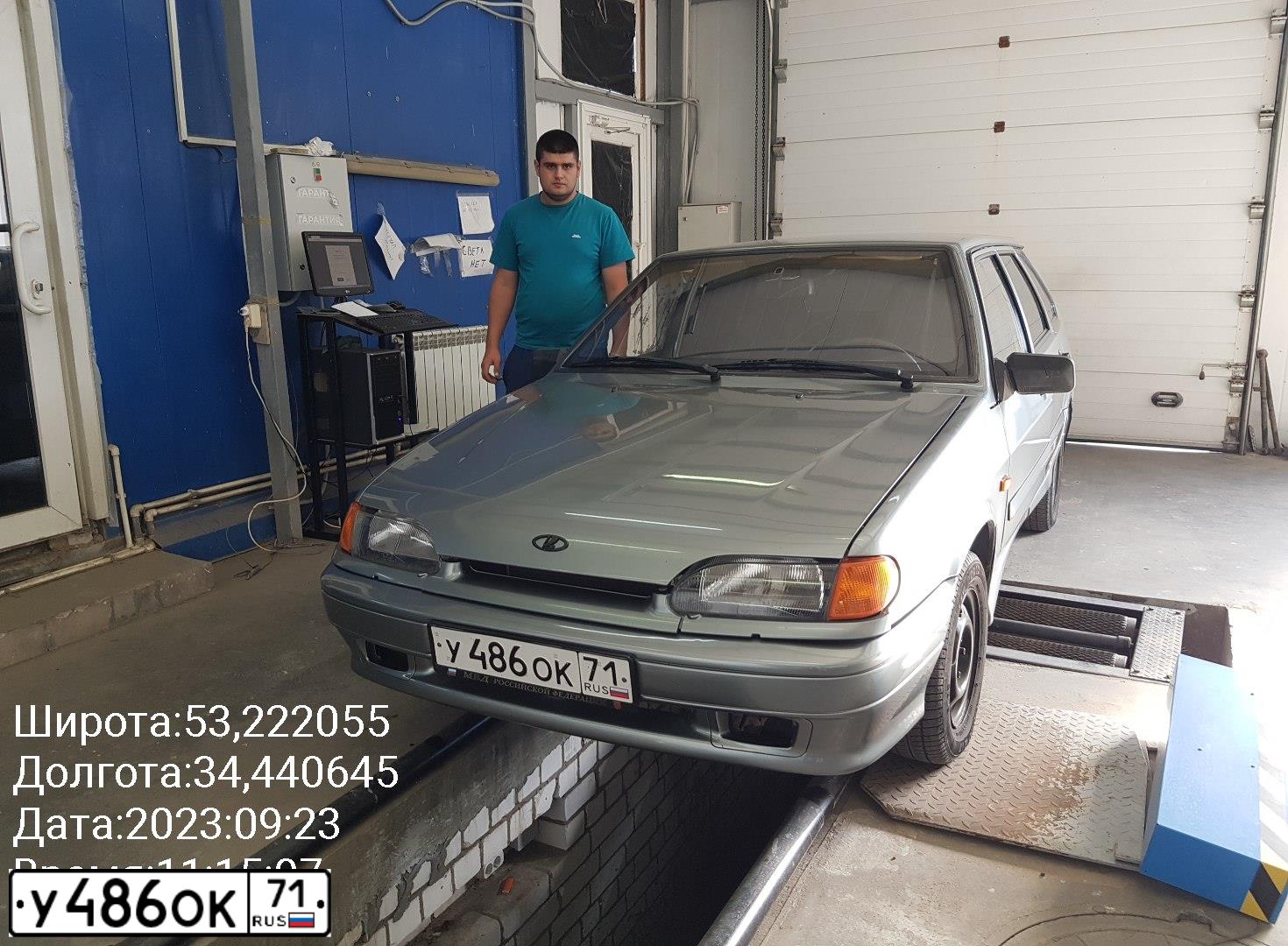 Фото автомобиля LADA 211440 LADA SAMARA, 2009 — госномер Р667АЕ32. Цвет: СРЕДНИЙ СЕРО-ЗЕЛЕНЫЙ МЕТ.