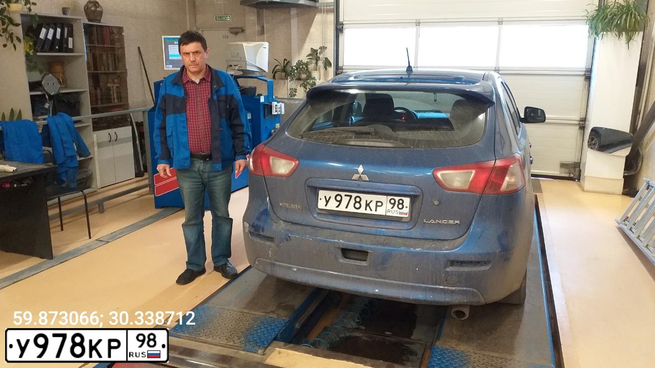 Фото автомобиля MITSUBISHI LANCER, 2008 — госномер М509ХВ198. Цвет: синий