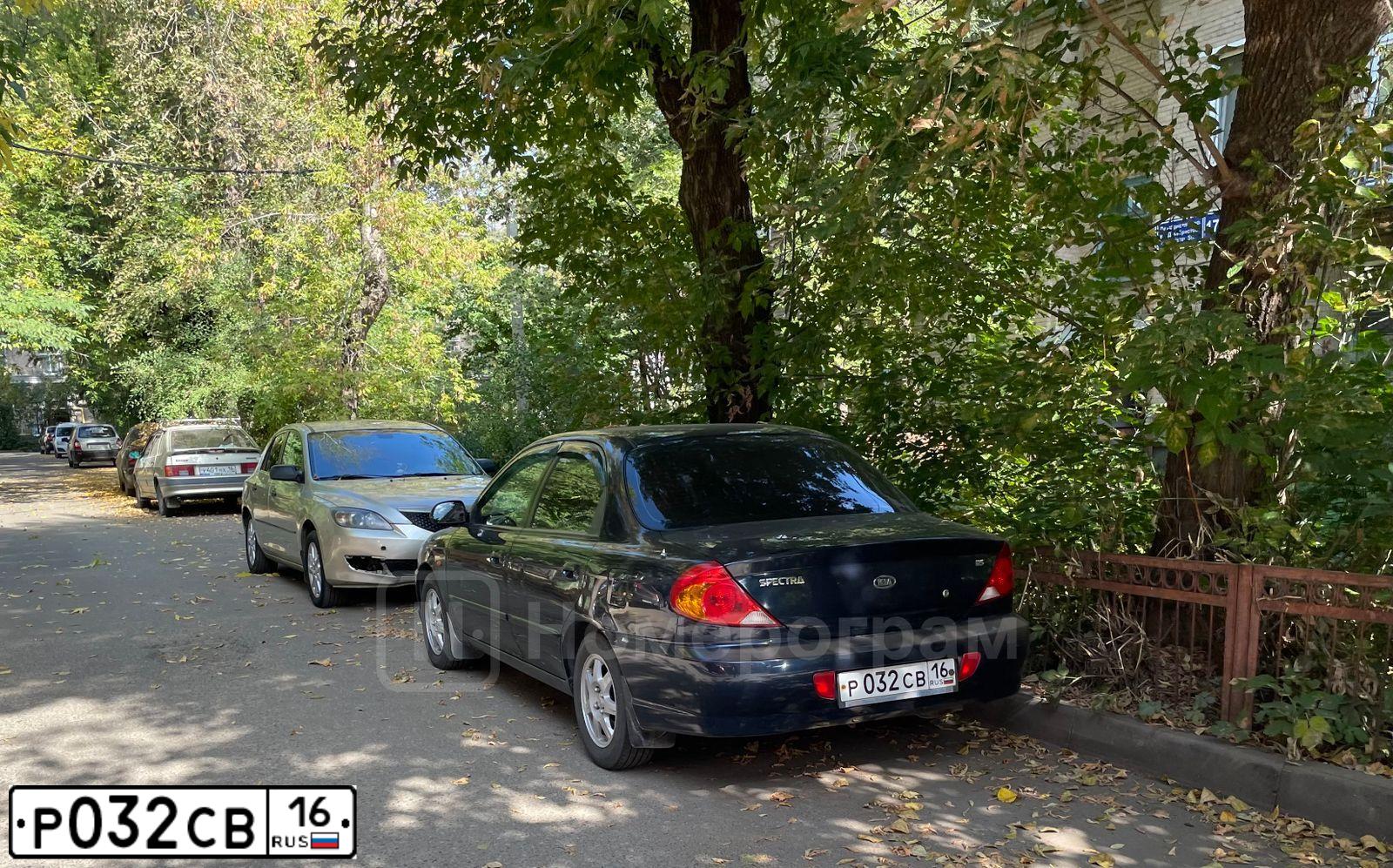 Фото автомобиля KIA SPECTRA, 2008 — госномер Р032СВ16. Цвет: ТЕМНО-СИНИЙ