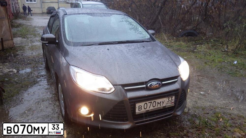 Фото автомобиля FORD FOCUS, 2012 — госномер Р761ВУ152. Цвет: СЕРО-КОРИЧНЕВЫЙ