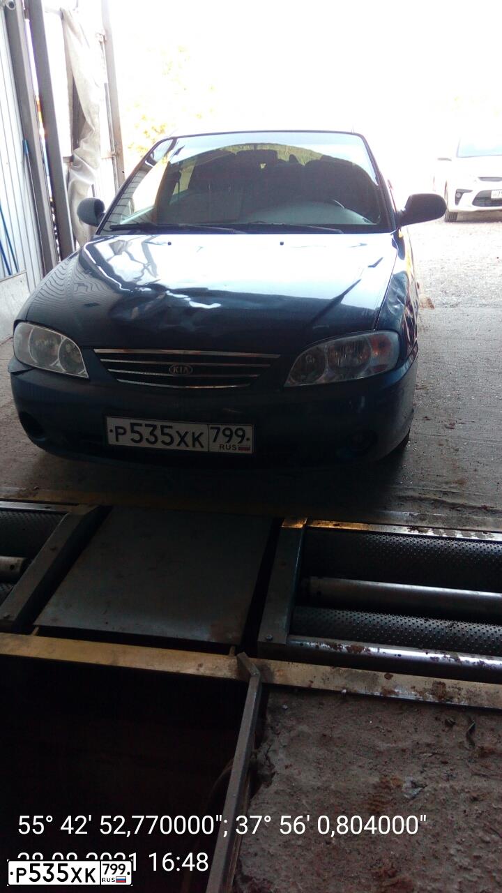 Фото автомобиля KIA SPECTRA, 2006 — госномер Р535ХК799. Цвет: синий
